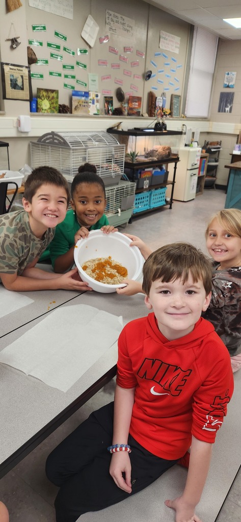 2nd grade students making and selling dog treats