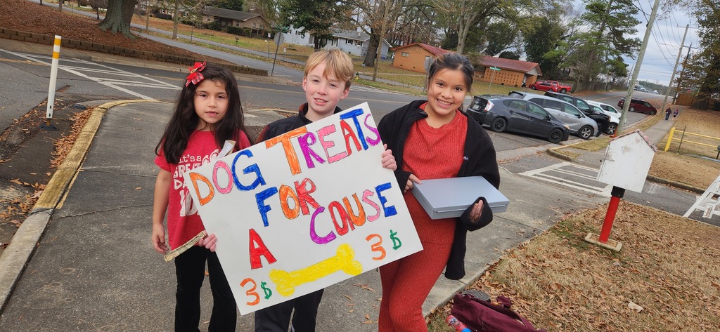 2nd grade students making and selling dog treats