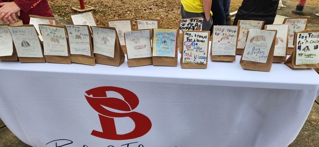 2nd grade students making and selling dog treats