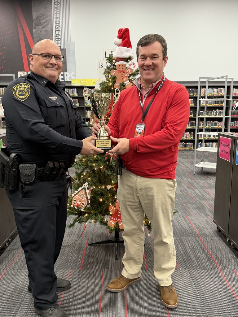 Mr. Gazaway receiving trophy for winning competition