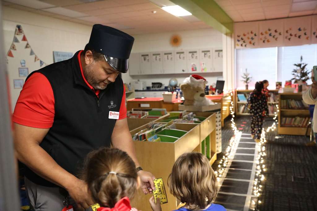 All aboard! 🚂❄️ Yesterday, Deputy Superintendent Nick Sun made a special stop at Westwood School to read "The Polar Express." After presenting their golden tickets, students traveled along the tracks to find the perfect reading spot while Mr. Sun brought the story to life as the Conductor. A magical journey full of imagination and joy!