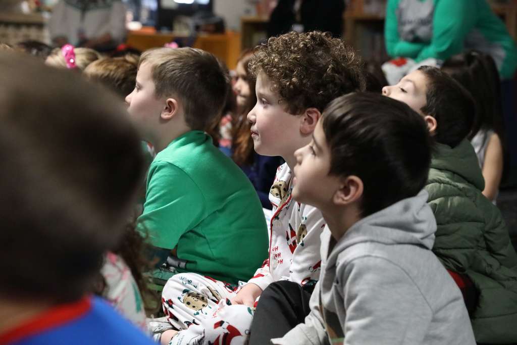All aboard! 🚂❄️ Yesterday, Deputy Superintendent Nick Sun made a special stop at Westwood School to read "The Polar Express." After presenting their golden tickets, students traveled along the tracks to find the perfect reading spot while Mr. Sun brought the story to life as the Conductor. A magical journey full of imagination and joy!