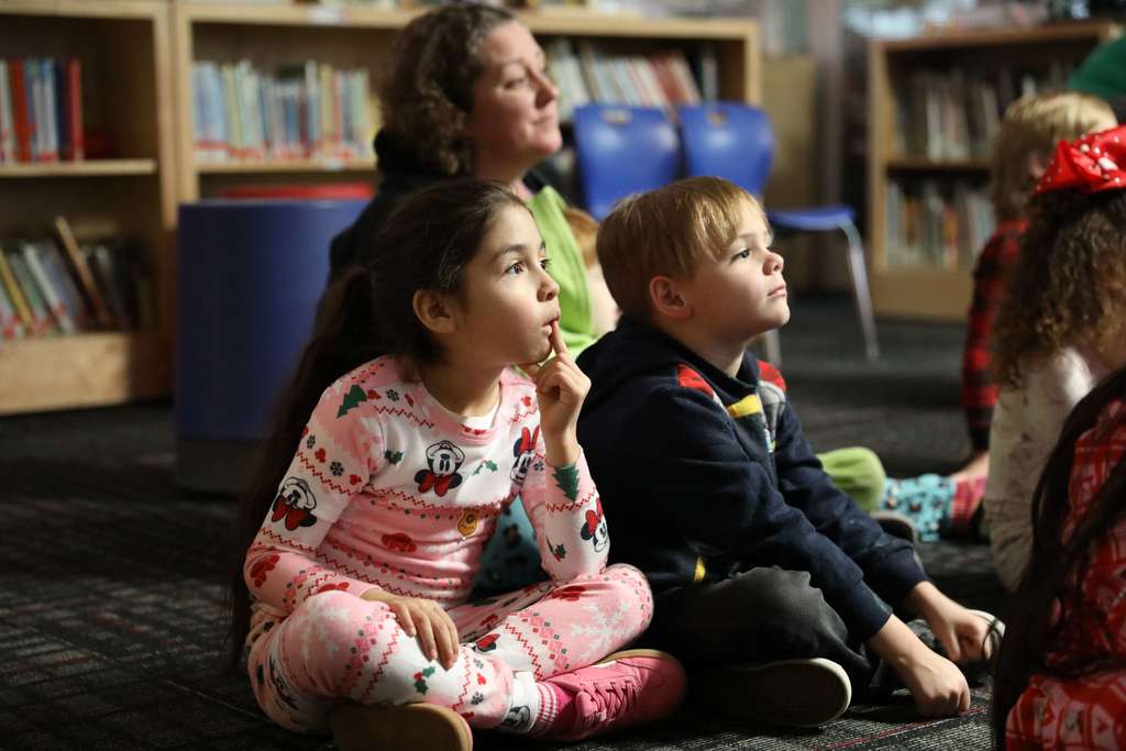 All aboard! 🚂❄️ Yesterday, Deputy Superintendent Nick Sun made a special stop at Westwood School to read "The Polar Express." After presenting their golden tickets, students traveled along the tracks to find the perfect reading spot while Mr. Sun brought the story to life as the Conductor. A magical journey full of imagination and joy!
