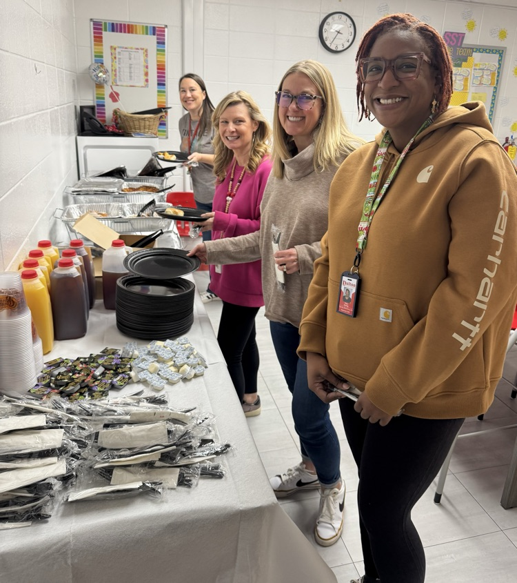 Teachers getting breakfast 