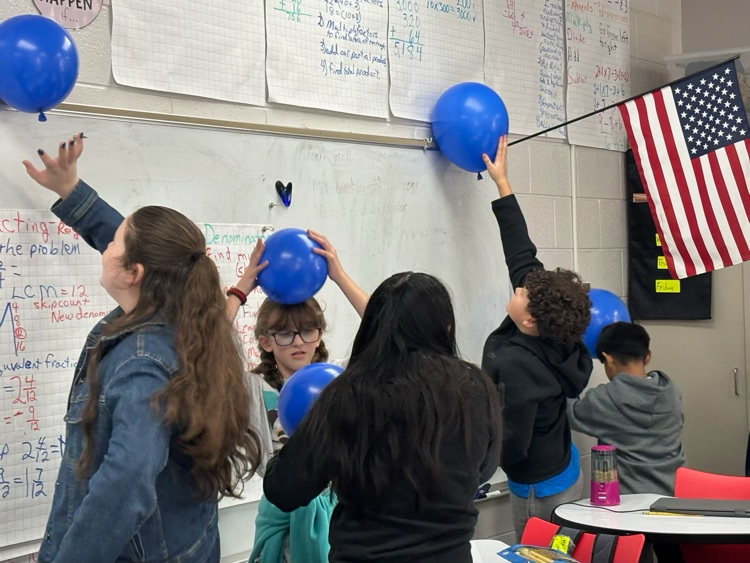 students with science experiment