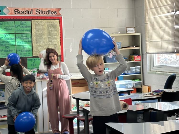 students with science experiment