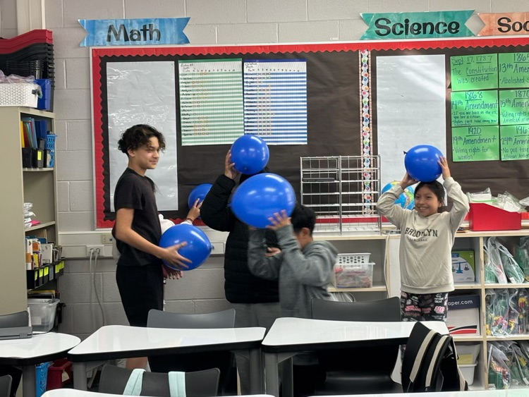 students with science experiment