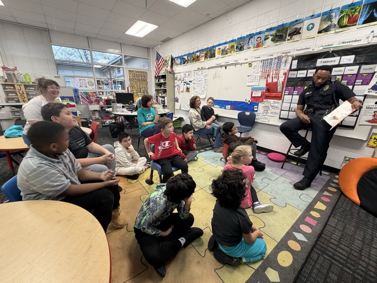 Officer Johnson talking to the students 