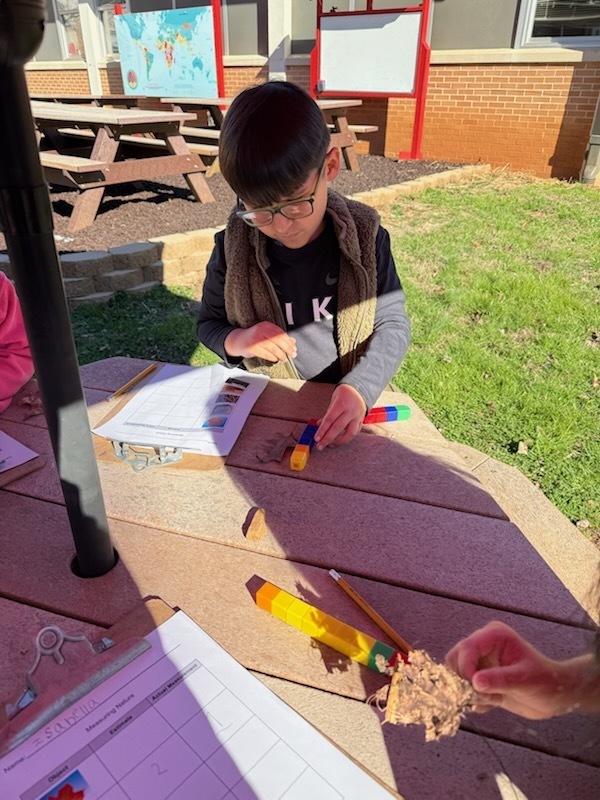 1st graders working outside