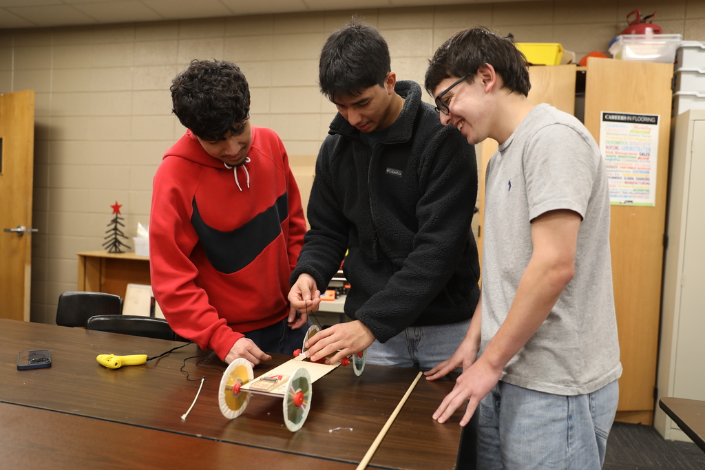 CTAE Month highlight ⚙️🚗 Engineering and Technology students at Dalton High School, led by instructor Paul White, are applying problem-solving, design, and critical-thinking skills through hands-on projects. In these photos, students are designing and building mousetrap cars using 3D-printed and laser-cut components of their own creation—testing their designs for speed or distance while learning the engineering design process in action. #CTAEMonth