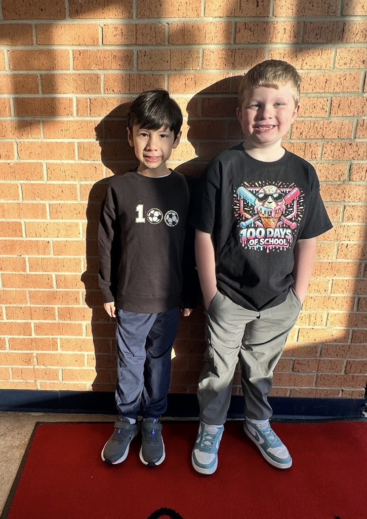 Students with 100 days shirts  