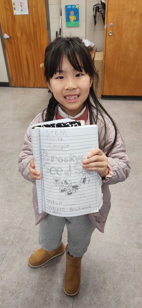 students sharing STEM journals