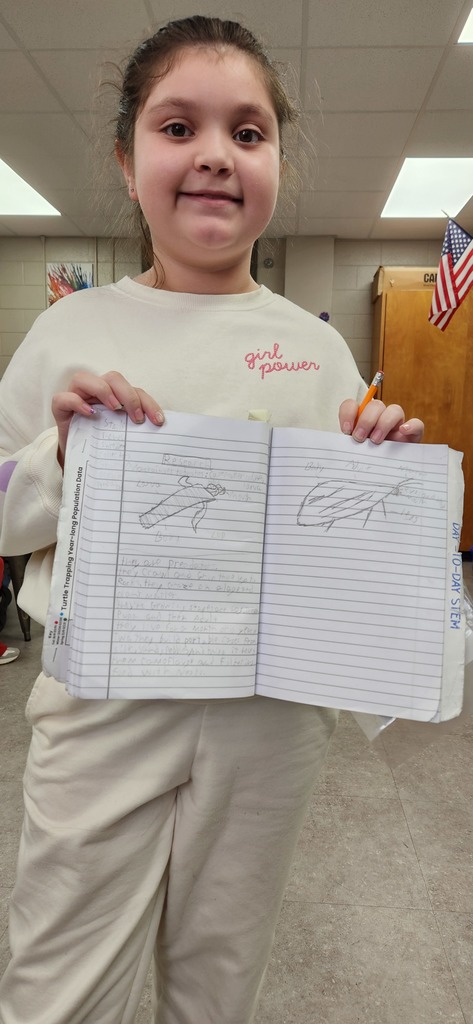 students sharing STEM journals