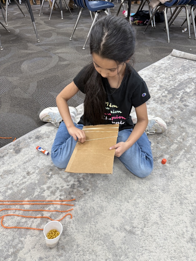 students building musical instruments