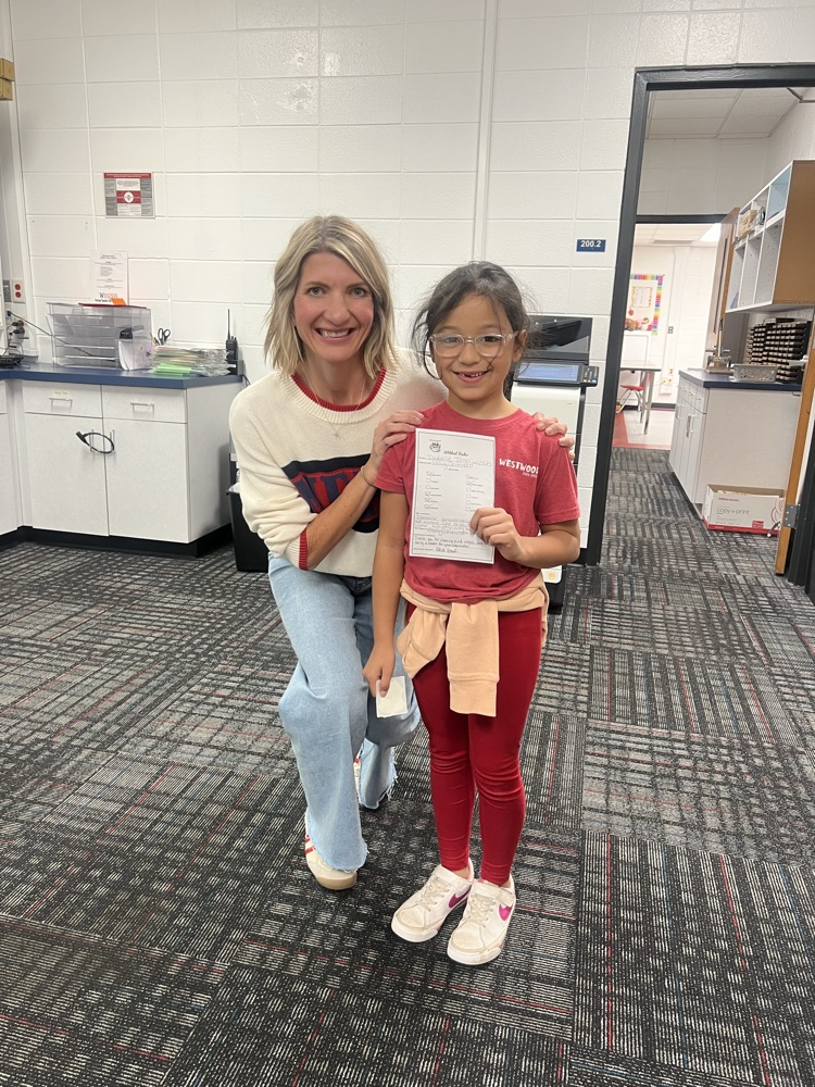 Mrs. Smith with a student 