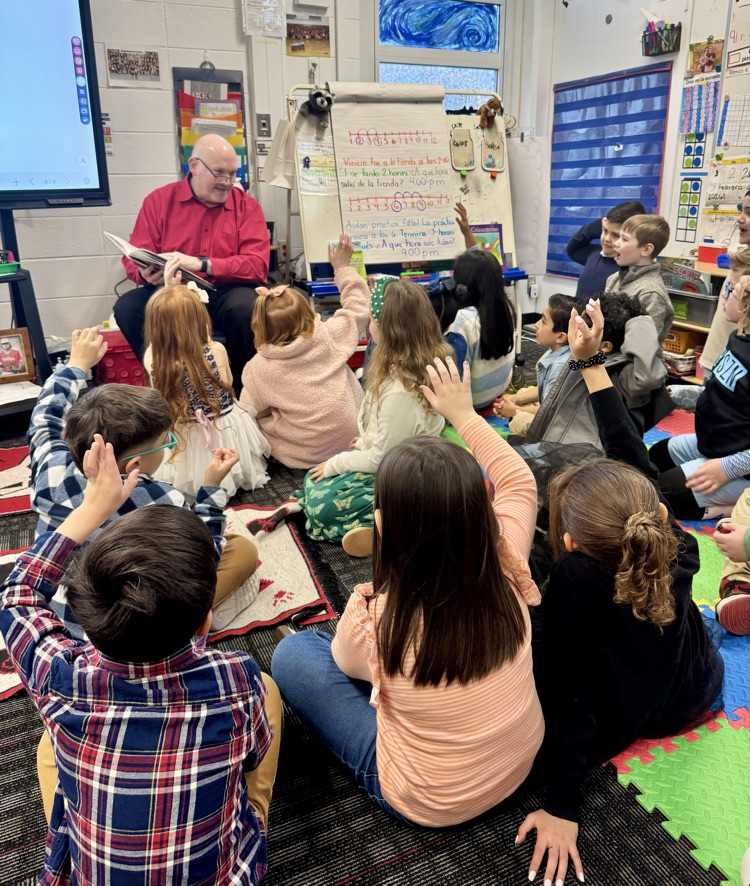 Dr. Craft reading to a 1st grade class 