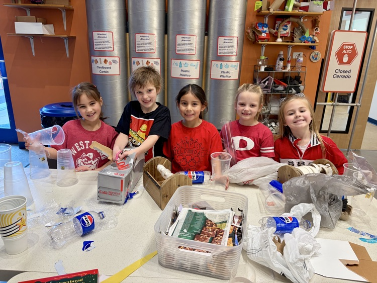 Students building with recycled materials 