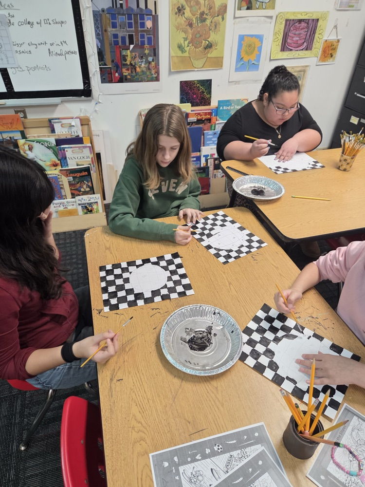 Students working on drawings 