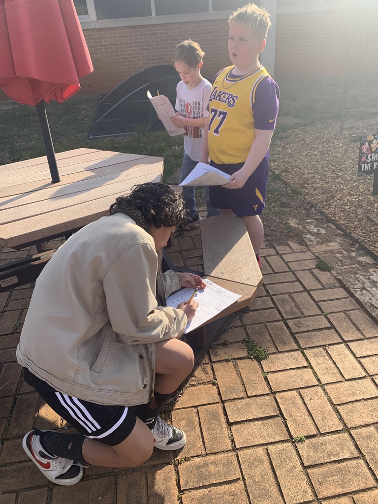 4th grade students outside measuring angles