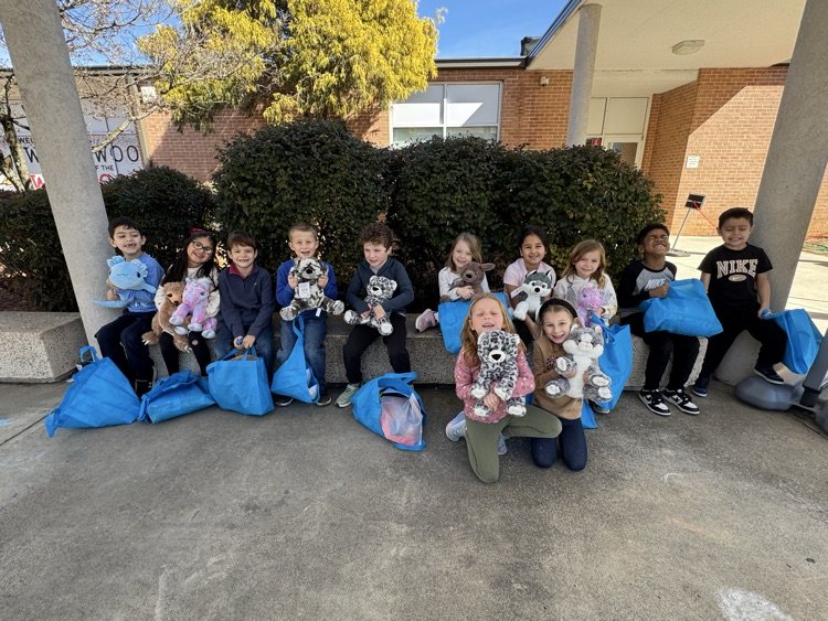 A kindergarten class with their buddies 