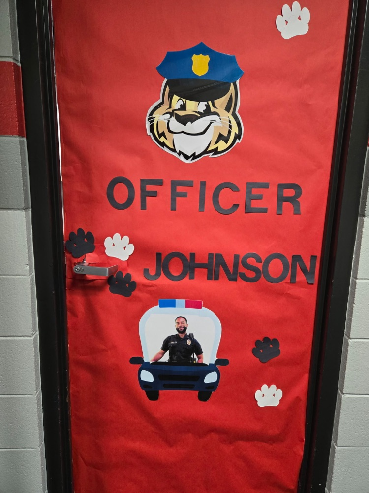 A picture of Officer Johnson’s office door decorated 