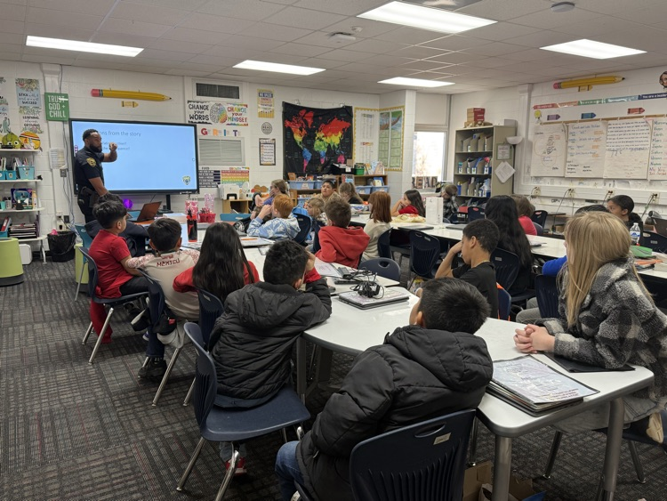 Officer Johnson answering questions from students 