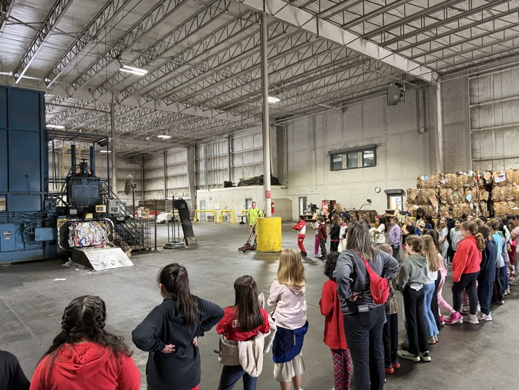 Students learning about where the trash goes once it gets to the landfill 