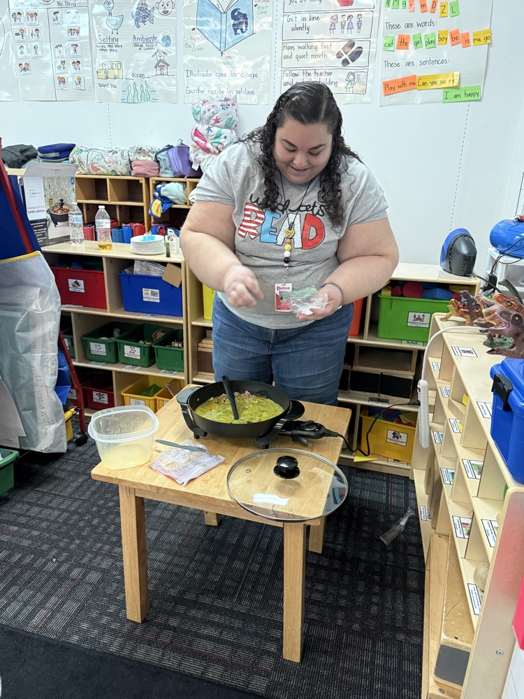 Mrs. Landeros cooking green eggs and ham 