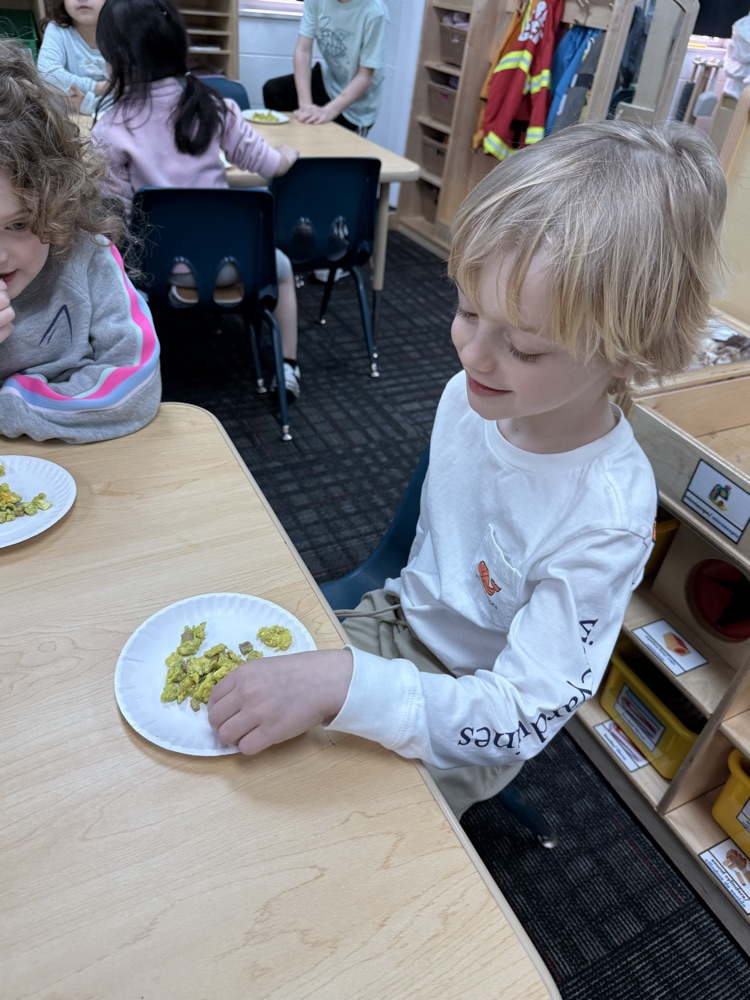 Student trying green eggs and ham 