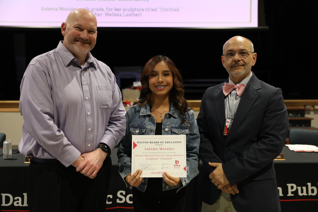 During the March 9 Board of Education meeting, Dalton Public Schools recognized student achievements, staff leadership, and community excellence across the district while also celebrating School Board Appreciation Month with a special presentation honoring the Dalton Board of Education.  The Board recognized the Middle School Varsity Basketball Team for earning BGMSAA Runner-up honors, and the Dalton High School Game Day Cheer Team for qualifying for the 2026 State Tournament. The Board also honored Dalton High School senior Angela Ramirez-Ramirez for being named a QuestBridge National College Match Scholar, and student-athletes from Dalton Junior High School and Hammond Creek Middle School who were selected for the Georgia Middle School All-Star Basketball Team.  In addition, the Board recognized Jeff Wells for his leadership in guiding all 10 Dalton Public Schools to earn the Ready Georgia Seal of Preparedness. Students from Dalton High School were also honored for their work featured in the Hunter Museum Teen Art Show, including Giselle Nunez, Aaron Augustine, and Sulema Morales, whose artwork earned recognition and awards.  The Board also celebrated Dr. Steven Craft for being named a 2025–2026 Superintendent to Watch by the National School Public Relations Association (NSPRA).  The Board congratulates all honorees for their dedication, talent, and commitment to excellence in Dalton Public Schools.