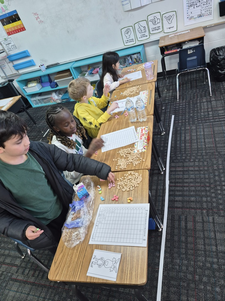 A picture of the students sorting their cereal 