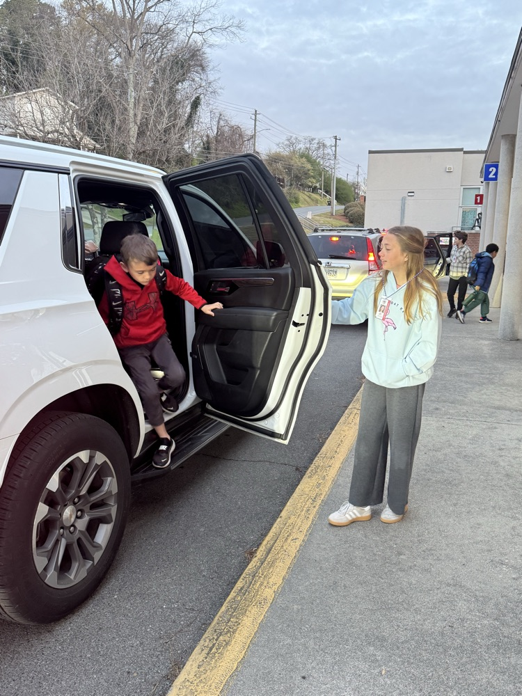 Student helping with morning duty 