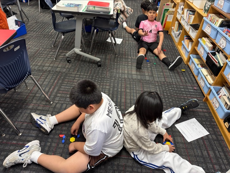 Students working on their pattern block design 