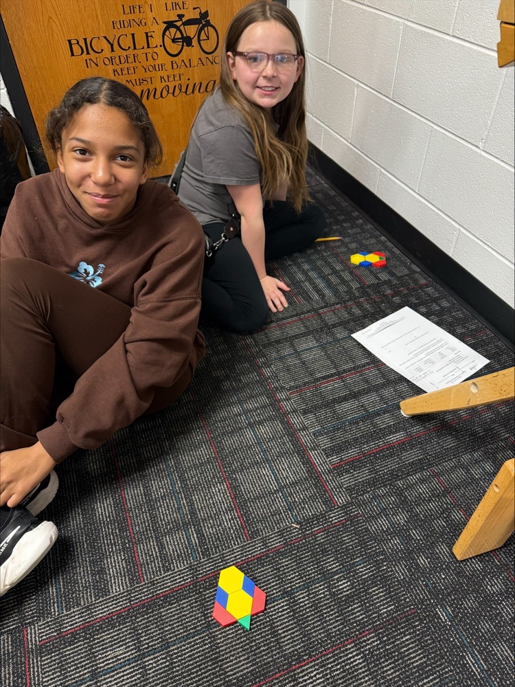 Students with their pattern block design 