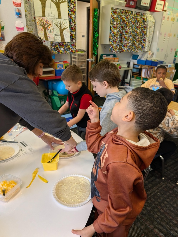 Students learning how to do a quesadilla