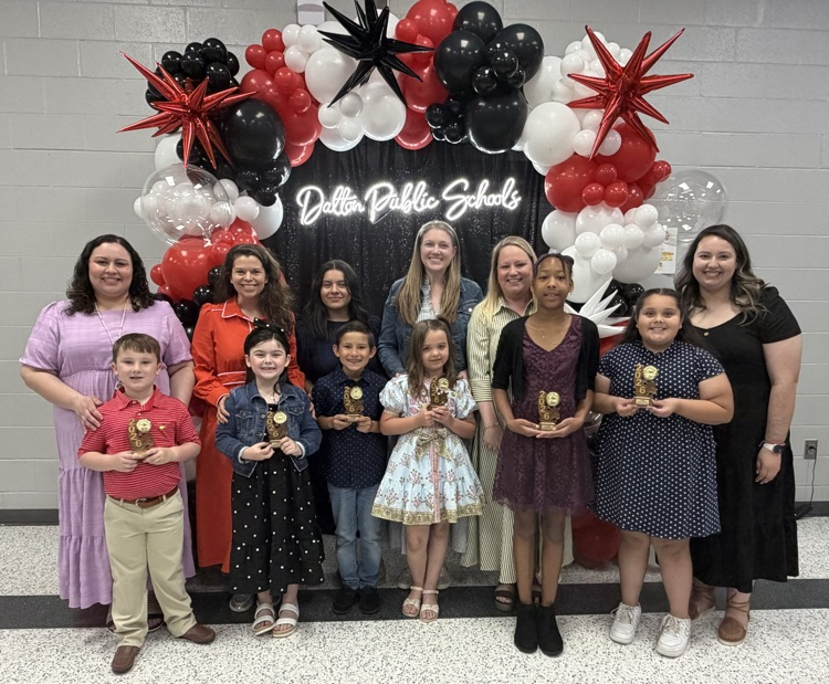 A picture of the students with their teachers.