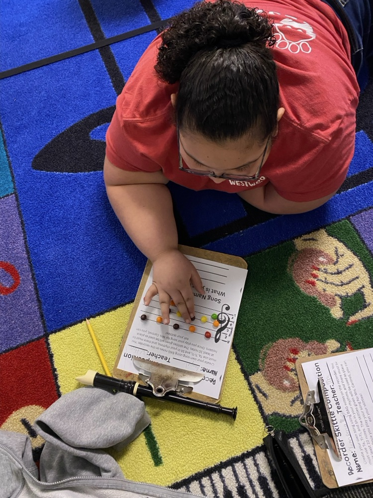 Student reading music