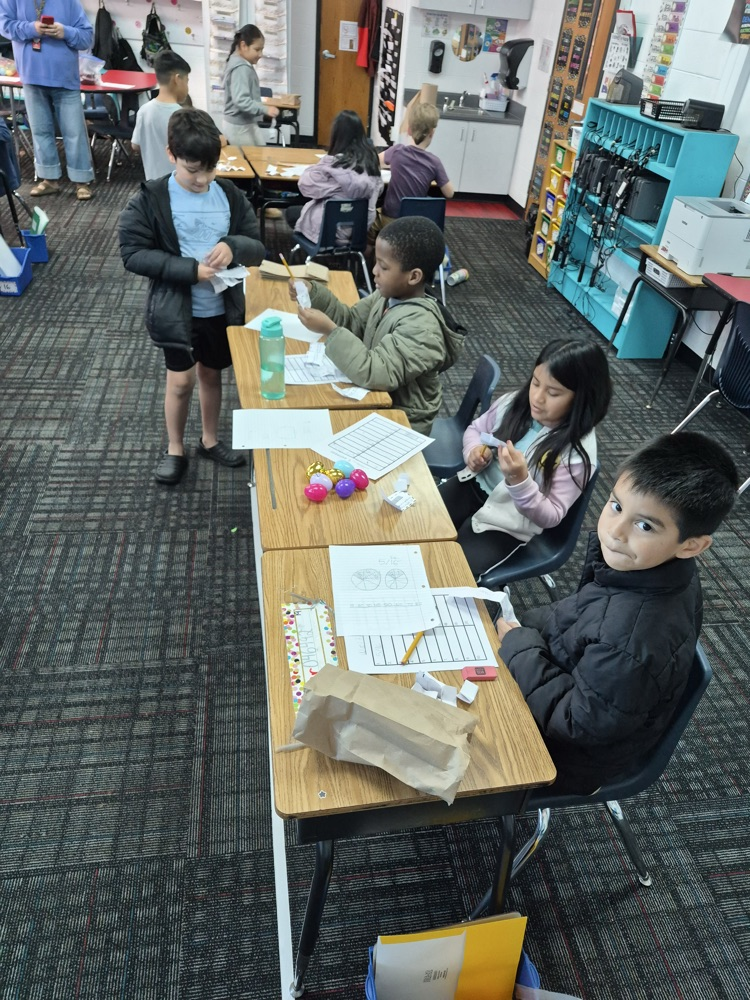 Students reading their math problems 