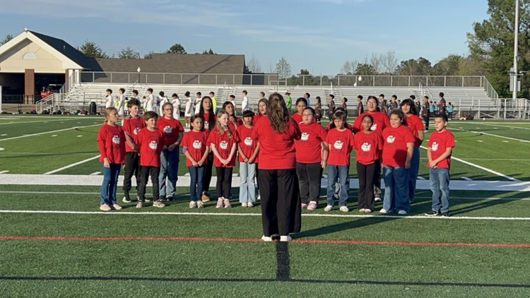 Westwood Chorus singing at TDA’s soccer game 