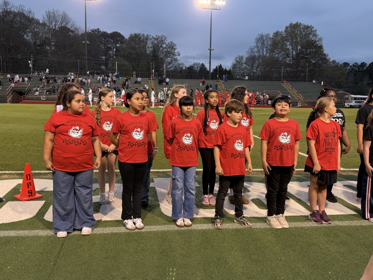 Westwood Chorus singing at DHS soccer game