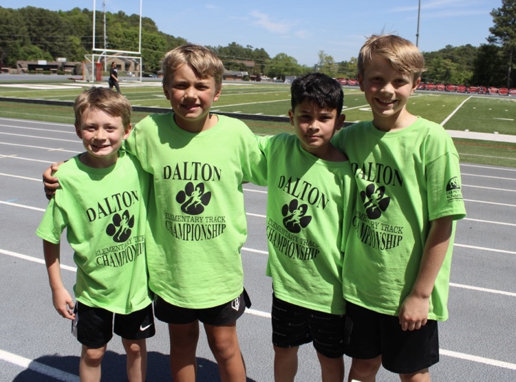 Third grade boys after winning their race