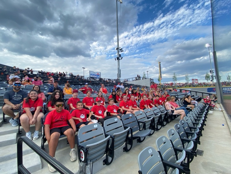 Students watching the game from the stands