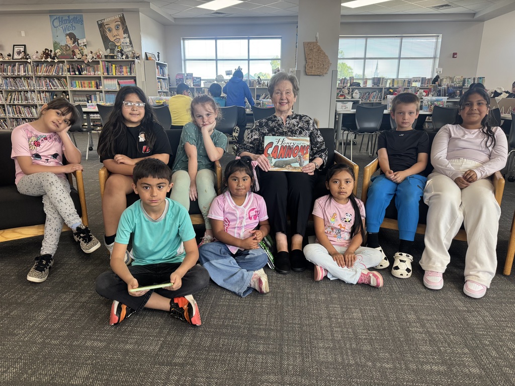 Photo of class with representative from the Daughters of the American Revolution 