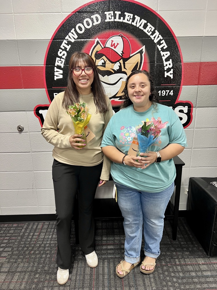 A picture of the front office staff 