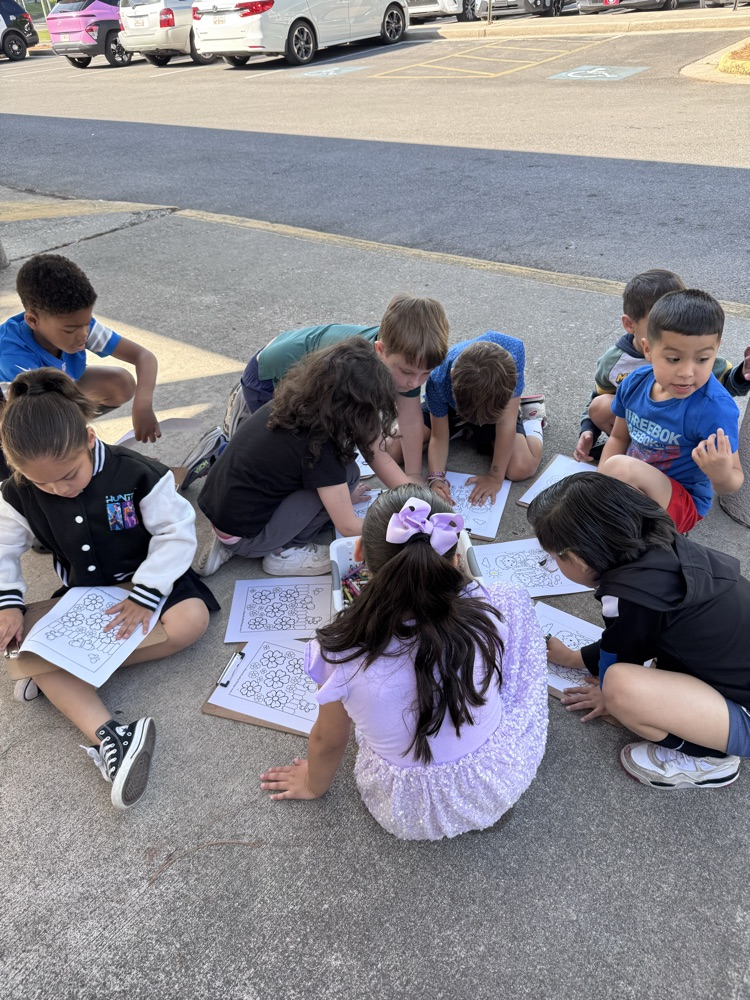 Students coloring outside 