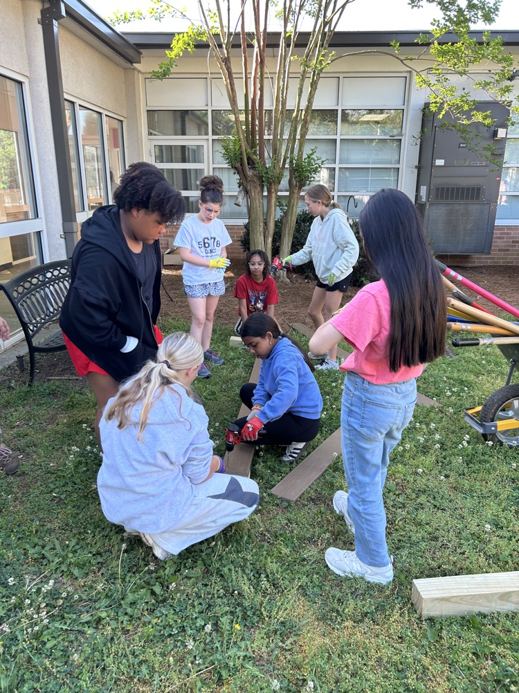 Students building the flower beds 