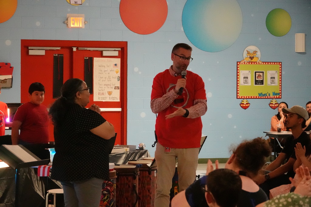 Mr. Headrick and Mrs. Vanegas thanking parents at the orff and chorus concert