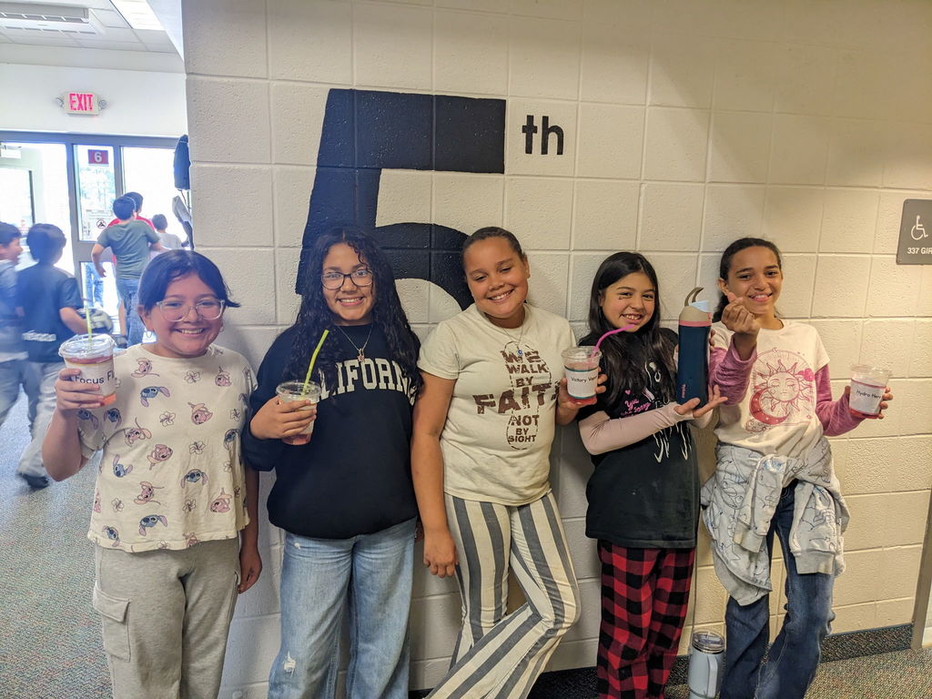 students enjoying drinks from hydration station