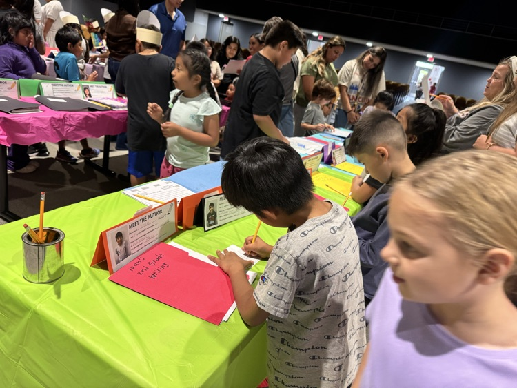 second grade students at publishing party