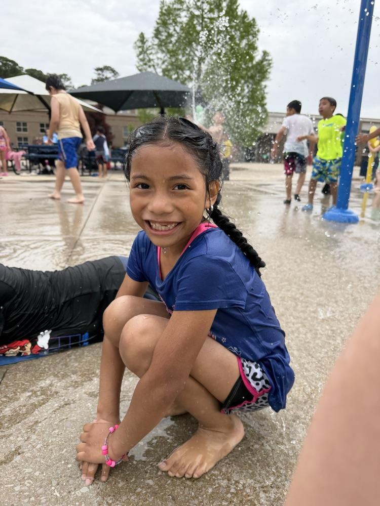 students at splash pad 